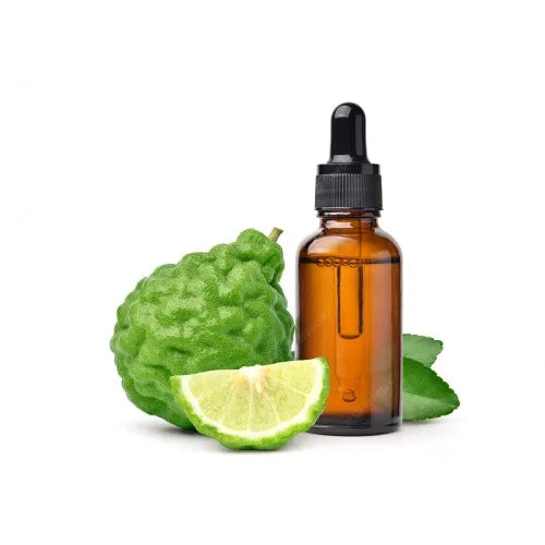 Bergamot Essential Oil in an amber bottle with a black dropper cover with a whole bergamot and a quarter bergamot fruit 